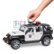 Jeep Wrangler Unlimited Rubicon – radiowóz policyjny BRUDER z policjantem i wyposażeniem 02526